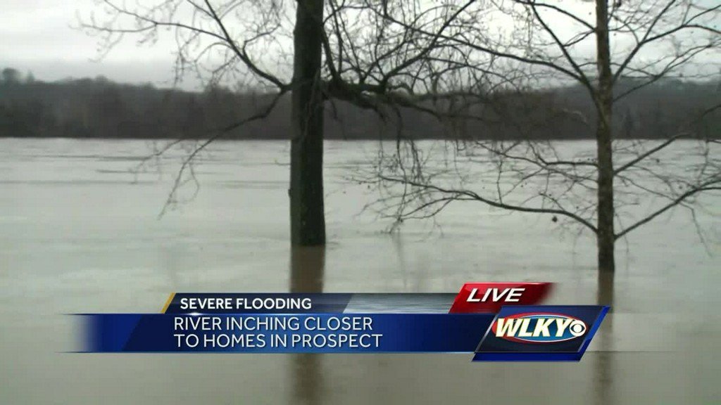 Flood waters are inching closer to homes along the Ohio River