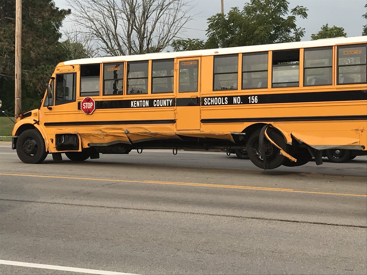Bus is up on the wrecker and ready to move. Both directions open on Turkeyfoot. Looks like bus rear end rolled over front of car