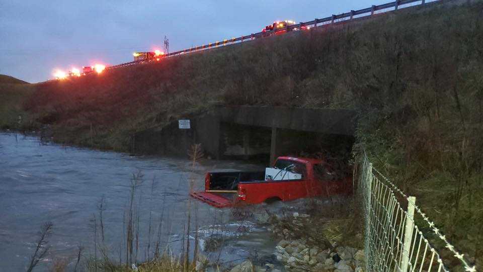 Adult, 3 children rescued from creek after driving through high water