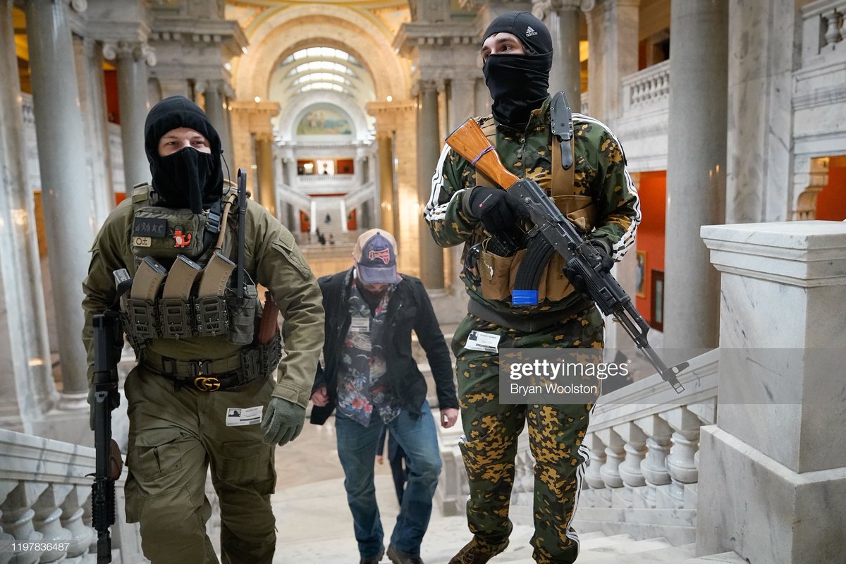 Gun rights activists carrying semi-automatic firearms walk through the Capitol Building on January 31, 2020 in Frankfort, Kentucky. Photo: @woolstonphoto