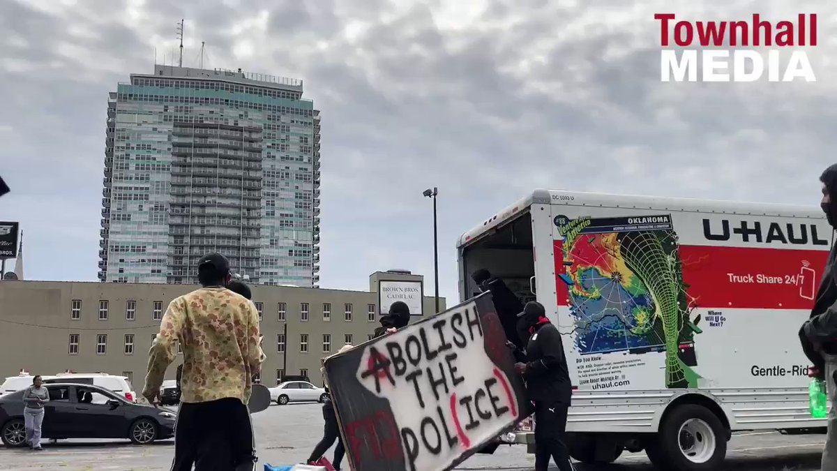 While the BLM crowd was marching in Louisville, a U Haul truck pulled up with shields and supplies for the group to use